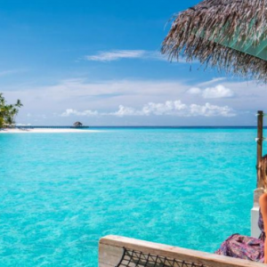 Baglioni Resort Maldives Maldives Honeymoon Packages Woman On Hammocks