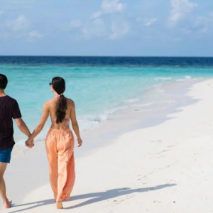 Anantara Kihavah Maldives Villas Maldives Honeymoon Packages Couple On Beach