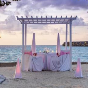Centara Ras Fushi Resort & Spa Maldives Maldives Honeymoon Packages Candlelit Dinner