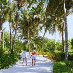 Centara Ras Fushi Resort & Spa Maldives Maldives Honeymoon Packages Couple At Pathway