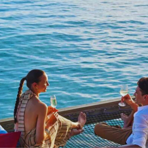 Centara Ras Fushi Resort & Spa Maldives Maldives Honeymoon Packages Couple On Hammock