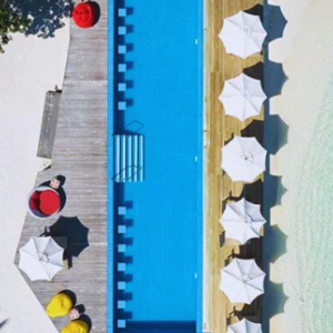 Centara Ras Fushi Resort & Spa Maldives Maldives Honeymoon Packages Pool Aerial View (1)