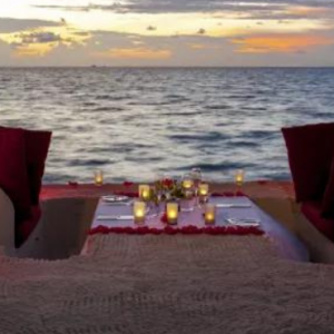 Centara Ras Fushi Resort & Spa Maldives Maldives Honeymoon Packages Sand Sofa Dinner