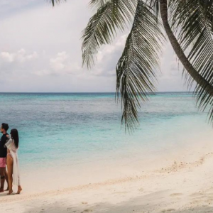 Angsana Velavaru Maldives Honeymoon Packages Couple On Beach