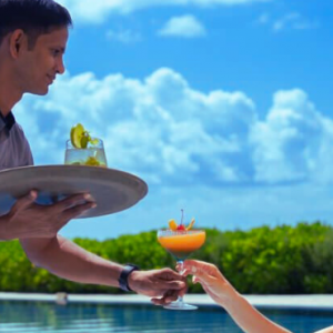 Atmosphere Kanifushi Maldives Honeymoon Packages Couples At Pool