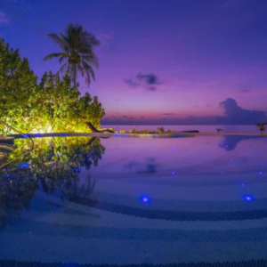 Atmosphere Kanifushi Maldives Honeymoon Packages Pool At Night
