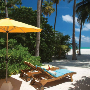 Atmosphere Kanifushi Maldives Honeymoon Packages Sunset Beach Villa1