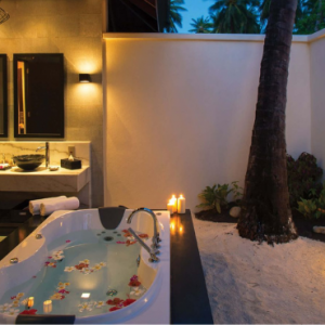 Atmosphere Kanifushi Maldives Honeymoon Packages Sunset Beach Villa3