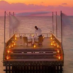 Baros Maldives Maldives Honeymoon Packages Piano Deck At Sunset