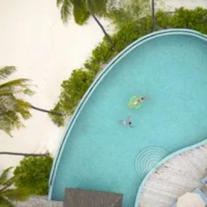 Centara Grand Island Resort And Spa Maldives Maldives Honeymoon Packages Aerial View Pf Pool