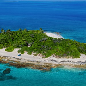 JA Manafaru - Luxury Maldives honeymoon packages - castaway island aerial view1