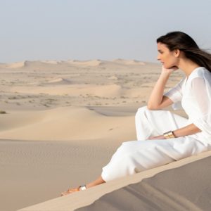 Abu Dubai Honeymoon Packages Jumeirah Al Wathba Woman On Desert